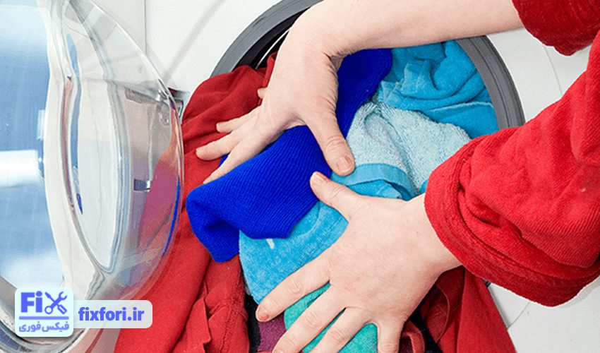 پر کردن زیاد لباسشویی علت لرزش ماشین لباسشویی اسنوا