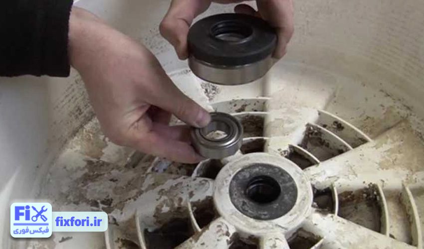 علت کند و سفت چرخیدن دیگ لباسشویی