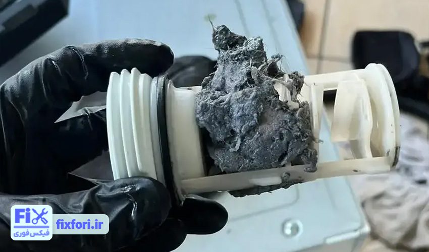 تعمیرات ماشین لباسشویی فیلکو به دلیل آبکشی نکردن لباس‌ها