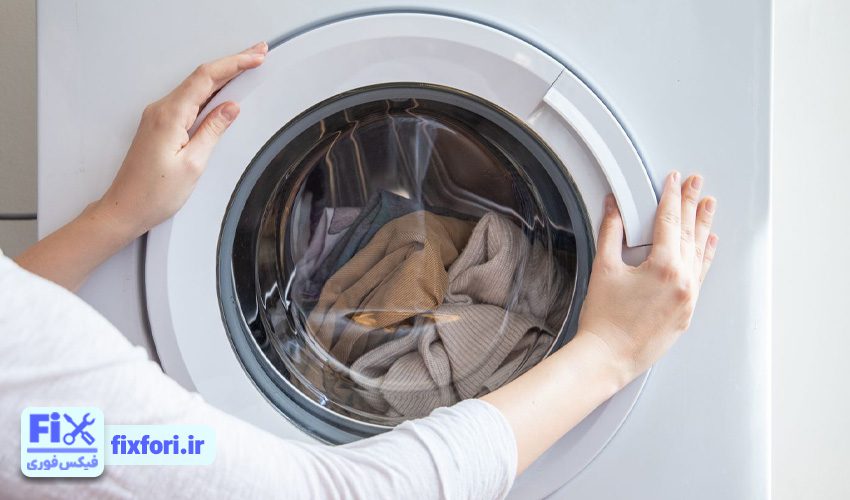 ماشین لباسشویی قفل شده است و درب باز نمی‌شود