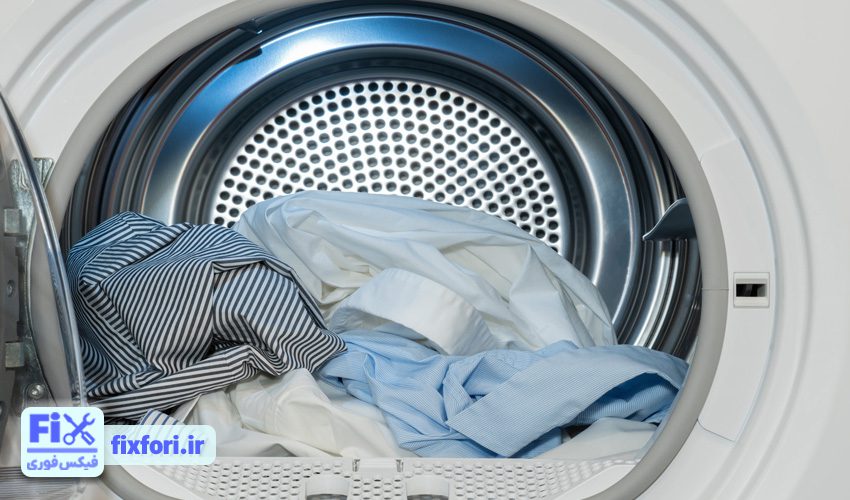 گیر کردن لباس بین محفظه و درب ماشین لباسشویی